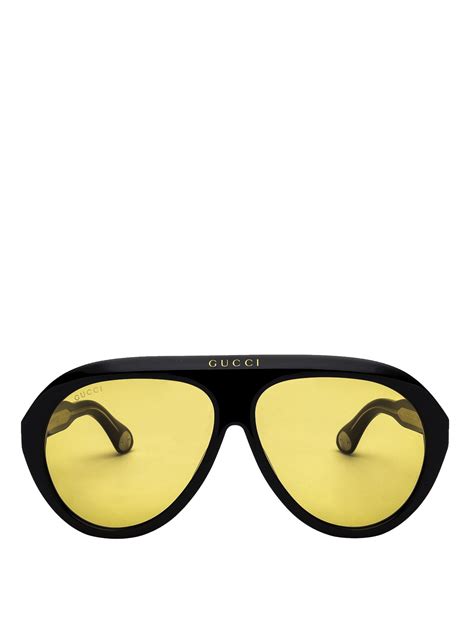 gucci sunglasses with yellow lenses.